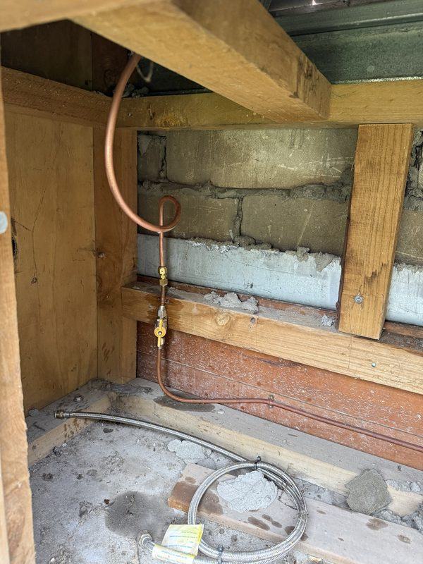 After: the flexi replaced with a fixed copper run and isolation valve