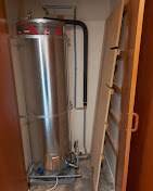 Indoor hot water cylinder installed in a Christchurch airing cupboard